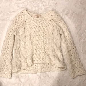 Has knitted look and spacing between some of the “knitting” super cute!!